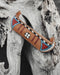 Symbolic boat-shaped leather bag for sacred practices, handcrafted and hand-painted with care and intention.