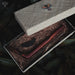 Wooden tools in a box with natural materials and Ayahuasca branding.