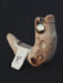 Wooden hook with a metal ball on a dark background
