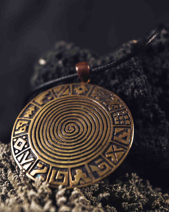 Discover the timeless allure of our "Infinity Spiral" handcrafted amulet, available in captivating copper and bronze variations. Adorned with an antique patina, it symbolizes limitless growth and cosmic energy.