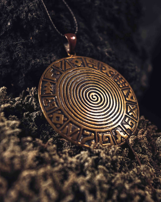 Discover the timeless allure of our "Infinity Spiral" handcrafted amulet, available in captivating copper and bronze variations. Adorned with an antique patina, it symbolizes limitless growth and cosmic energy.