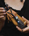 Traditionally crafted leather shamanic bag adorned with ethnic motifs, perfect for storing kuripe and hape tools, embodying the essence of ritual and tradition