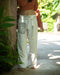 Handcrafted with attention to detail, Pants “The Spirit of Freedom”, Off White COTTON embody sustainable and eco-friendly fashion.