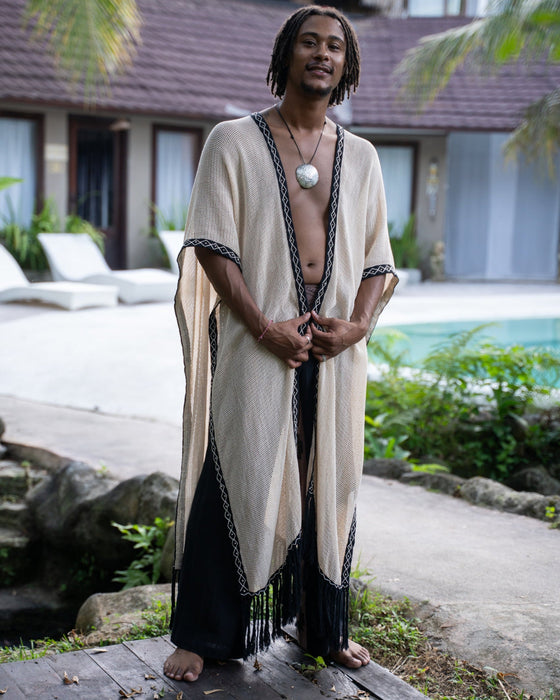 Unisex boho cotton poncho kimono with hand-embroidered sacred geometry design, made from eco-friendly materials