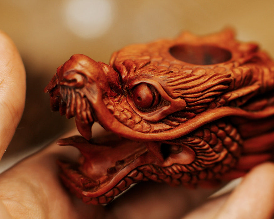 Unique dragon-themed smoking pipe, an excellent gift for smokers and dragon lovers alike.