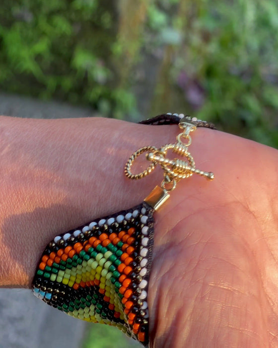 Handwoven bead loom bracelets with Ayahuasca-inspired tribal patterns, combining shamanic tools and talisman amulets for spiritual adornment