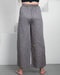 Elegant grey Thai pants with a silky cotton weave, designed for breathability and handmade with precision
