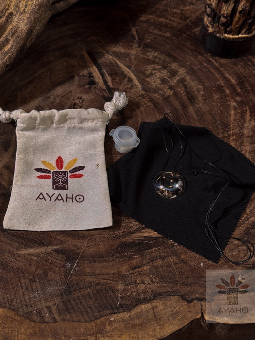 Ayaho branded items including a white drawstring bag and a black pouch on a wooden surface.