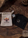 Ayaho branded items including a white drawstring bag and a black pouch on a wooden surface.