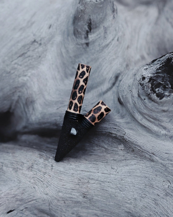 Volcanic energy bamboo kuripe pipe with a hematite stone, an exquisite shamanic hape snuff applicator, reflecting unique handcrafted artisanship