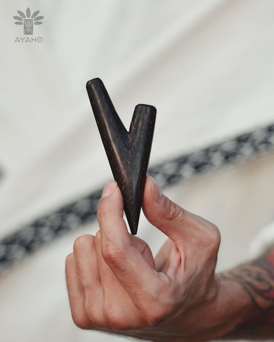 Handcrafted palm wood kuripe, emphasizing the quality and craftsmanship involved in its creation