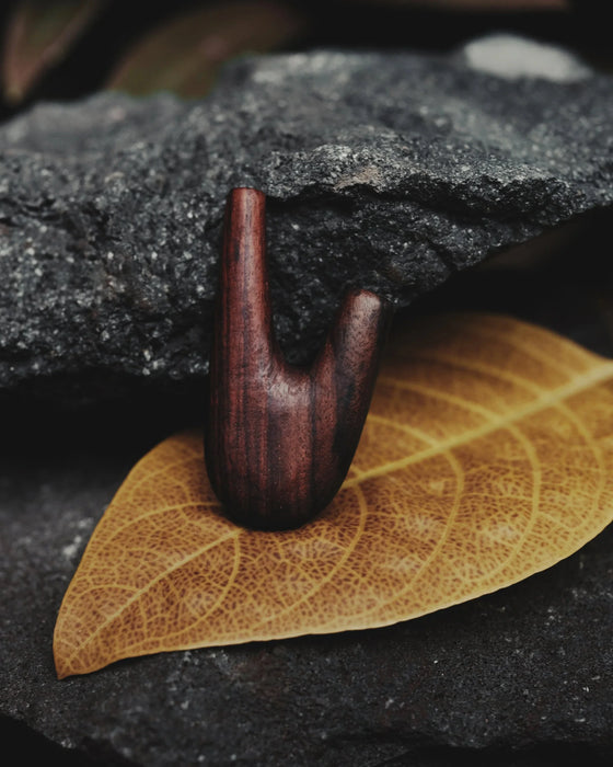 Discover the spiritual essence of the shamanic ritual with this handmade Kuripe pipe, a unique tool for Rapéh ceremonies. Crafted from rosewood and adorned with sacred geometry,  a special gift imbued with healing and protection