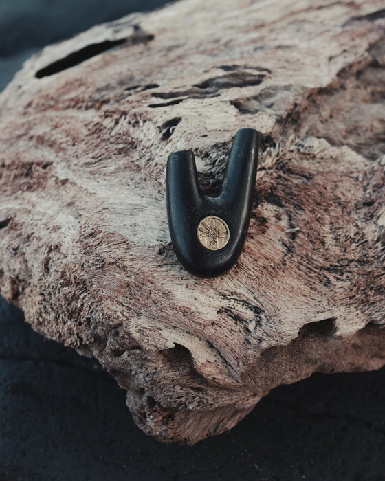 Perfect shape of Kuripe made from volcanic stone, harmoniously blending with natural elements.