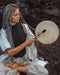 Hand-tuned tribal drum with intricately carved dragon handle, perfect for sound healing and spiritual ceremonies, crafted for a premium cosmic sound experience