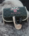 Earthy textures of the Kuripe pipe made from petrified wood, enhancing its tactile quality.