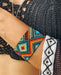 Handwoven bead loom bracelets with Ayahuasca-inspired tribal patterns, combining shamanic tools and talisman amulets for spiritual adornment