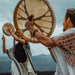 Hand-tuned tribal drum with intricately carved dragon handle, perfect for sound healing and spiritual ceremonies, crafted for a premium cosmic sound experience