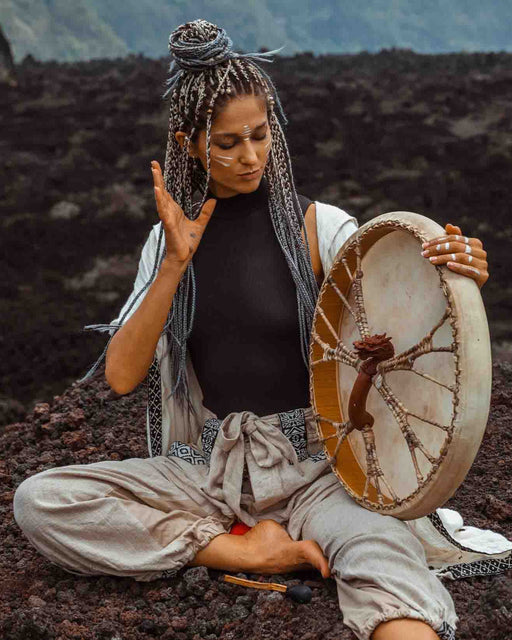 Hand-tuned tribal drum with intricately carved dragon handle, perfect for sound healing and spiritual ceremonies, crafted for a premium cosmic sound experience