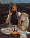 Hand-tuned tribal drum with intricately carved dragon handle, perfect for sound healing and spiritual ceremonies, crafted for a premium cosmic sound experience