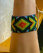 Handwoven bead loom bracelets with Ayahuasca-inspired tribal patterns, combining shamanic tools and talisman amulets for spiritual adornment