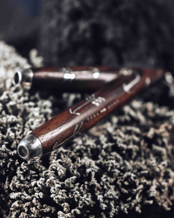 Wooden Intention kuripe pipe necklace with silver accents for hape snuff, a unique, handcrafted shamanic tool for herbal medicine rituals.