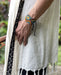 Handwoven bead loom bracelets with Ayahuasca-inspired tribal patterns, combining shamanic tools and talisman amulets for spiritual adornment