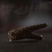 Decorative item with leopard print design on a dark background