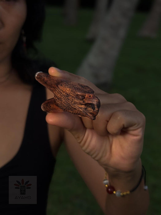 Person holding a textured object with a blurred background