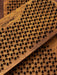 Wooden yoga mat with textured surface and brand name 'Pam Yoga' visible.