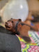 Close-up of a bear figurine with a blurred background