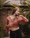 Discover the epitome of freedom and individuality with our exquisite Cotton Boho Crop Top, a garment that speaks to the soul of the free-spirited.