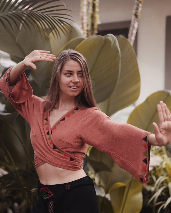 Discover the epitome of freedom and individuality with our exquisite Cotton Boho Crop Top, a garment that speaks to the soul of the free-spirited.