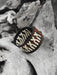 Bold, thick buffalo hide bracelet, handcrafted for a masculine, spiritual statement with raw, rugged beauty.