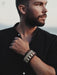 Ethnic-style buffalo leather bracelet, raw and bold, representing grounded energy and resilience.