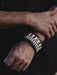 Handmade buffalo leather cuff with wide, bold design, symbolizing strength, spirituality, and ancestral connection.