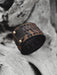 Handcrafted buffalo leather bracelet with earthy rust-brown tone and triple-infinity symbol — perfect for meditation or everyday wear.